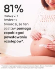 Aplikacja olejku przeciw rozstępom na brzuch w ciąży