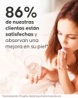 Pastilla efervescente de colágeno disolviéndose en vaso de agua
